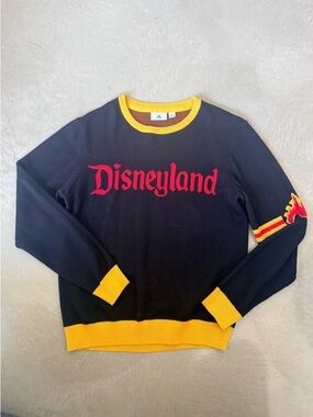 Disney Black Sweatshirt with Yellow Trim and Red Logo